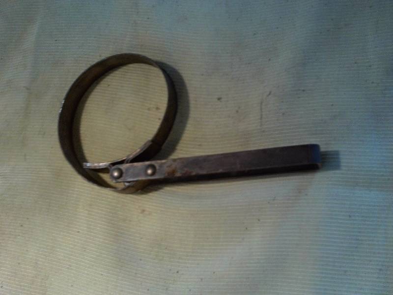 lot 45 image: vintage brass oil wrench