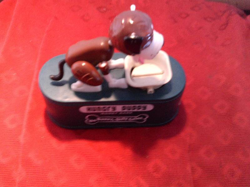 lot 49 image: plastic hungrey puppy bank