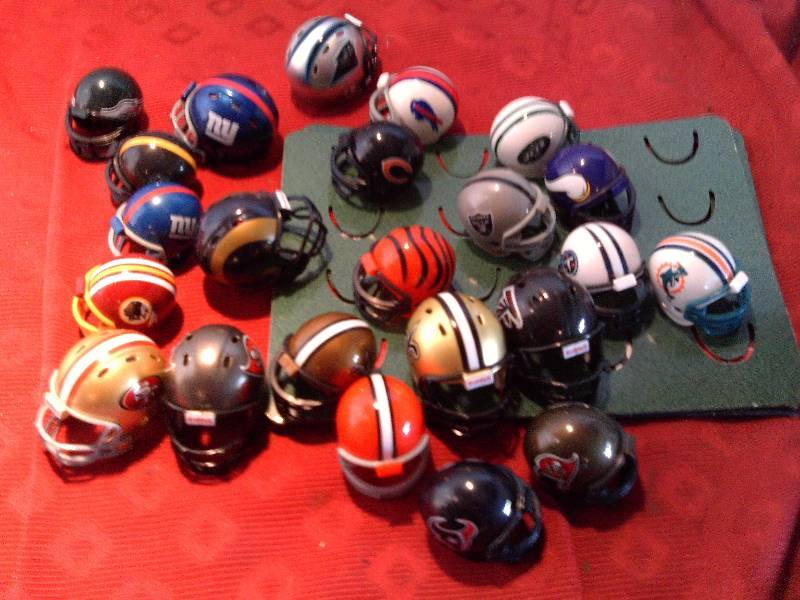 lot 101 image: COLLECTIBLE FOOTBALL HELMETS
