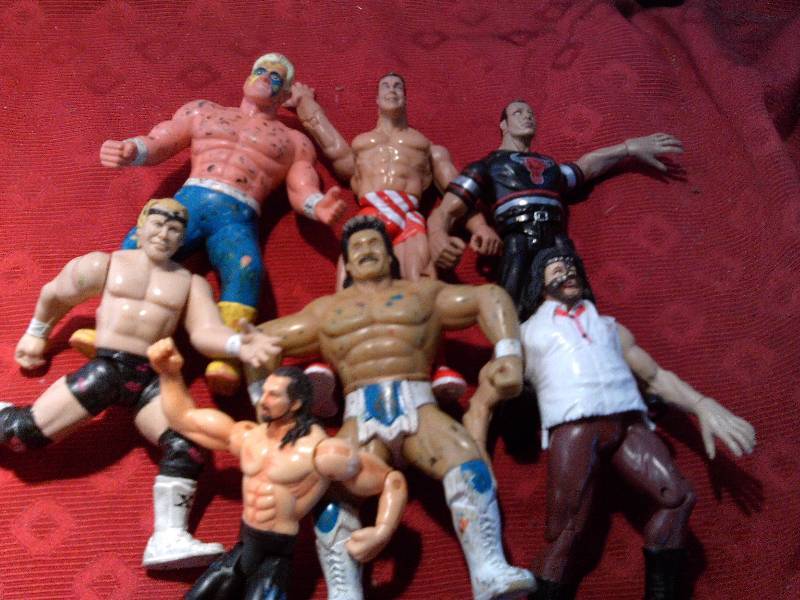 lot 103 image: 7 HIGHLY COLLECTIBLE WRESTLING ACTION FIGURES