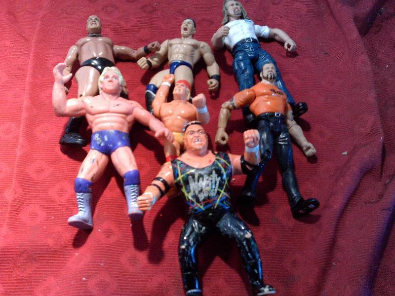lot 104 image: 7 HIGHLY COLLECTIBLE WRESTLING ACTION FIGURES