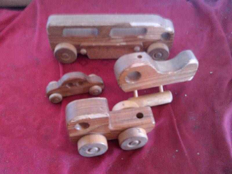 lot 108 image: solid WOOD HAND CRAFTED TOYS