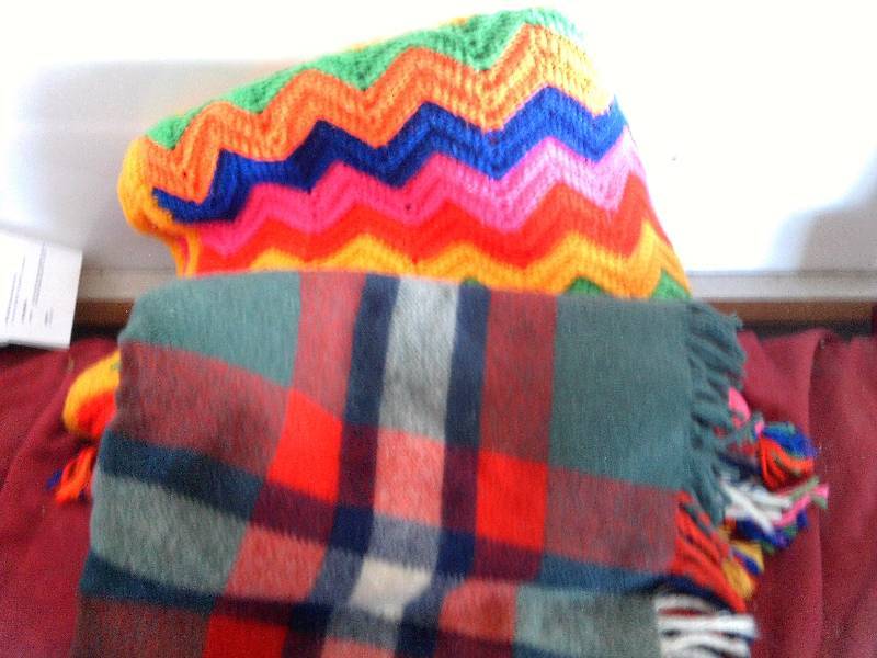 lot 128 image: 1 PLAID THROE 1 CROCHETED BLANKET
