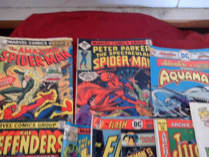lot 130 image: 9 SUPER HERO COMICS