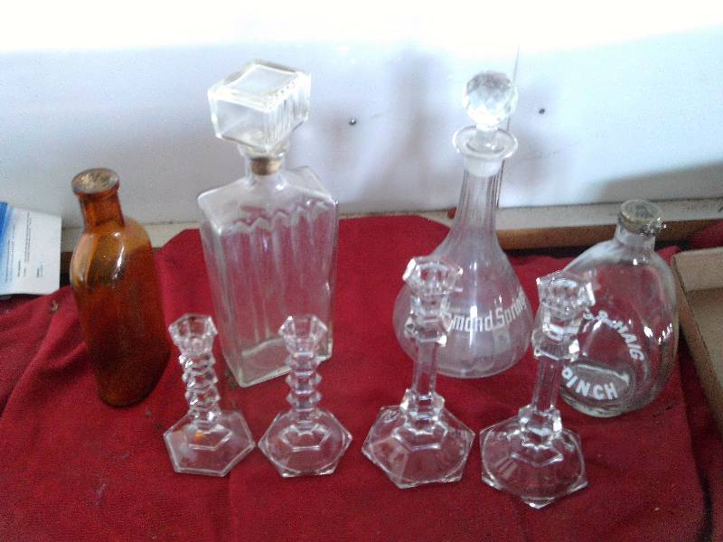 lot 153 image: 4 bottles 2 sets crystals candles holders