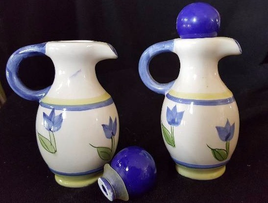Two tiny ceramic pitchers
