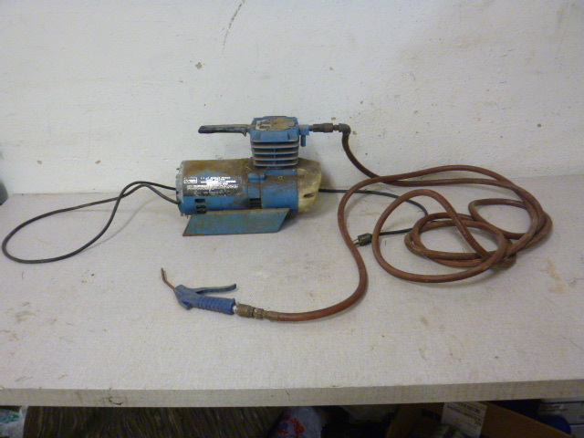 lot 243 image: Sears Oilless Piston Paint Sprayer