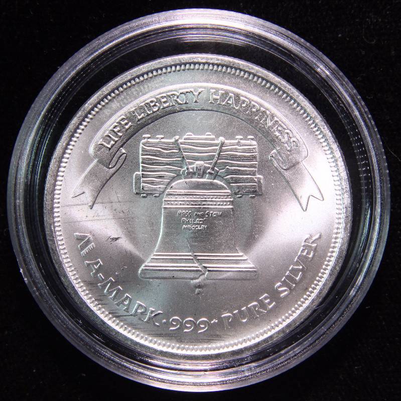1 TROY OZ. .999 FINE SILVER A-MARK LIBERTY ROUND IN AIRTITE HOLDER