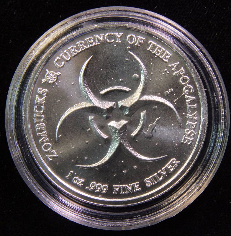 1 TROY OZ. .999 FINE SILVER ZOMBUCKS THE SAINT APOCALYPSE ROUND IN AIRTITE HOLDER