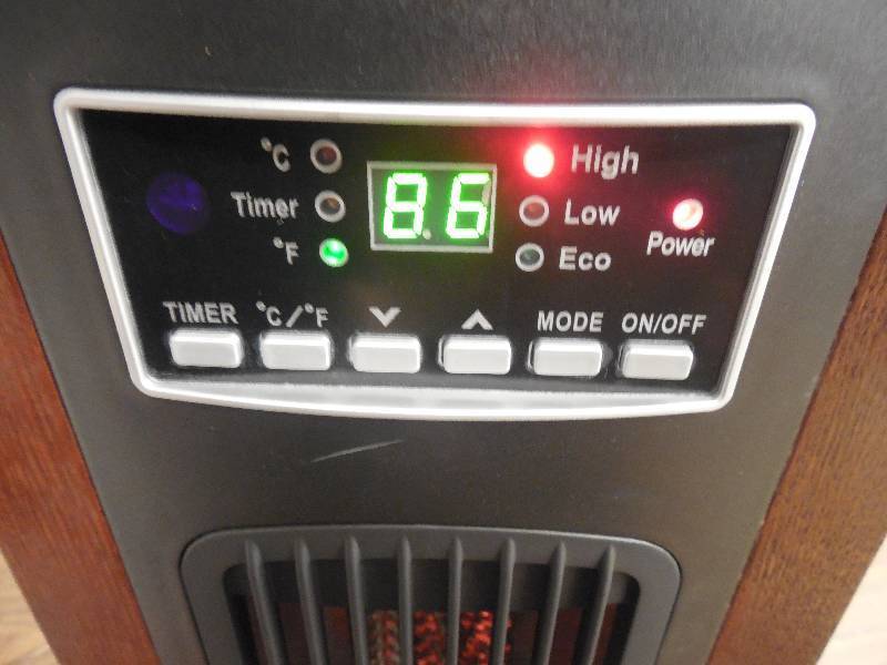 lot 134 image: 1500-Watt 3-Element Tower Infrared Electric Portable Heater with Remote Control