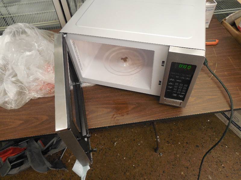 lot 136 image: 0.9 cu. ft. Countertop Microwave in Stainless Steel