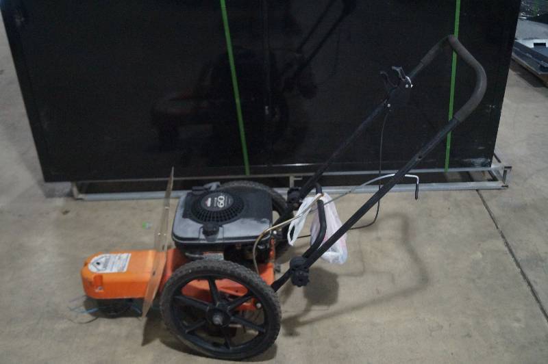 lot 14 image: Walk Behind String Trimmer