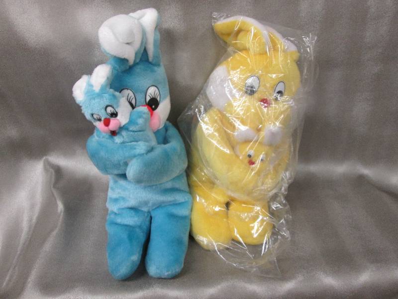 lot 34 image: Blue & Yellow Plush Bunnies with ve...