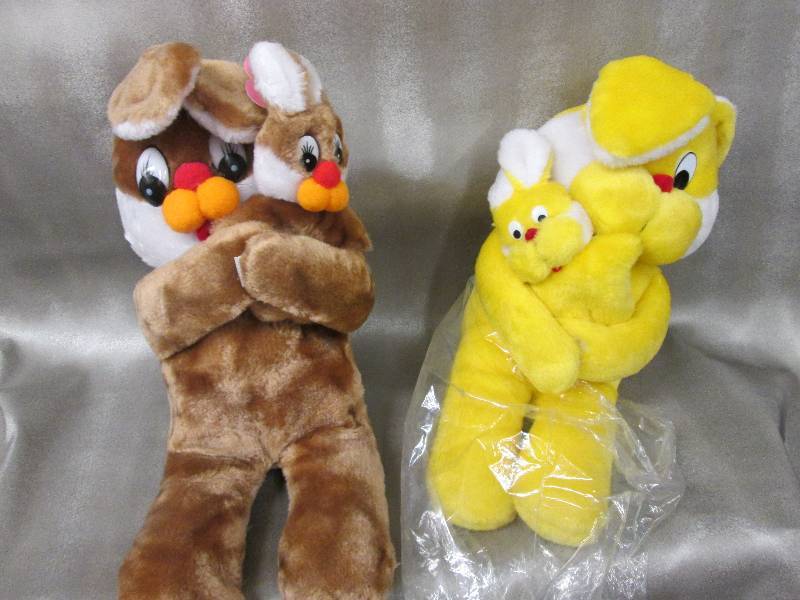 lot 35 image: Brown & Yellow Plush Bunnies with v...
