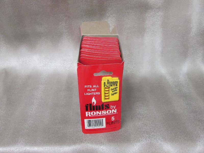lot 94 image: Box of 24 Ronson 5 Flints per card...