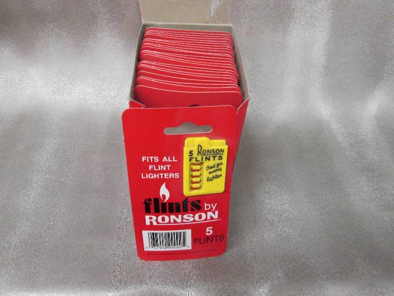 lot 96 image: Box of 24 Ronson 5 Flints per card...