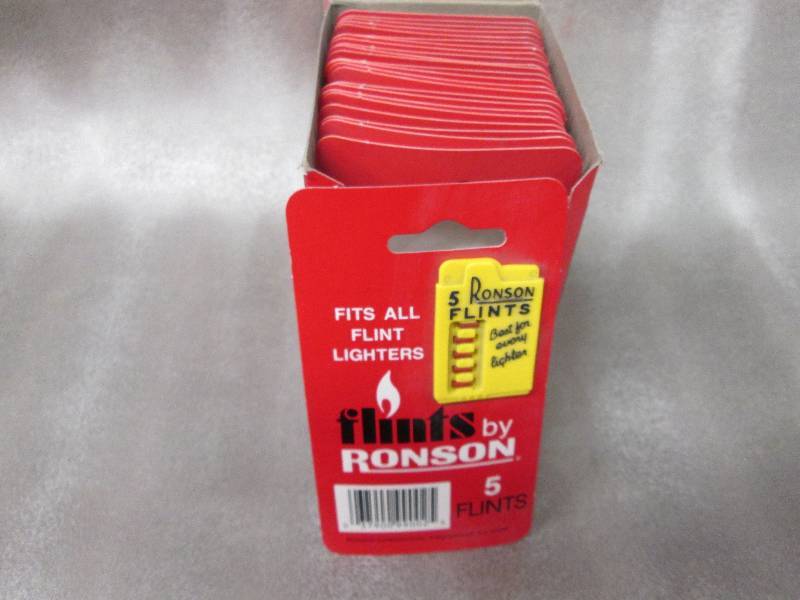 lot 98 image: Box of 24 Ronson 5 Flints per card...