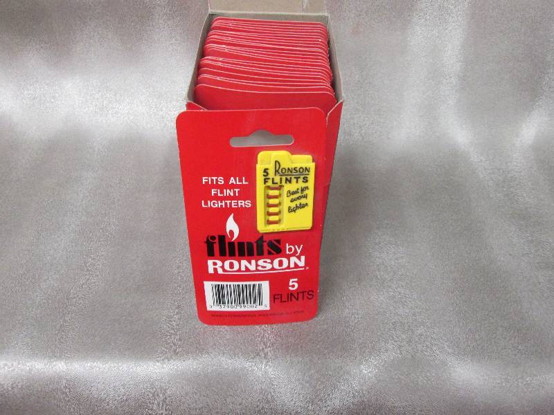 lot 101 image: Box of 24 Ronson 5 Flints per card...
