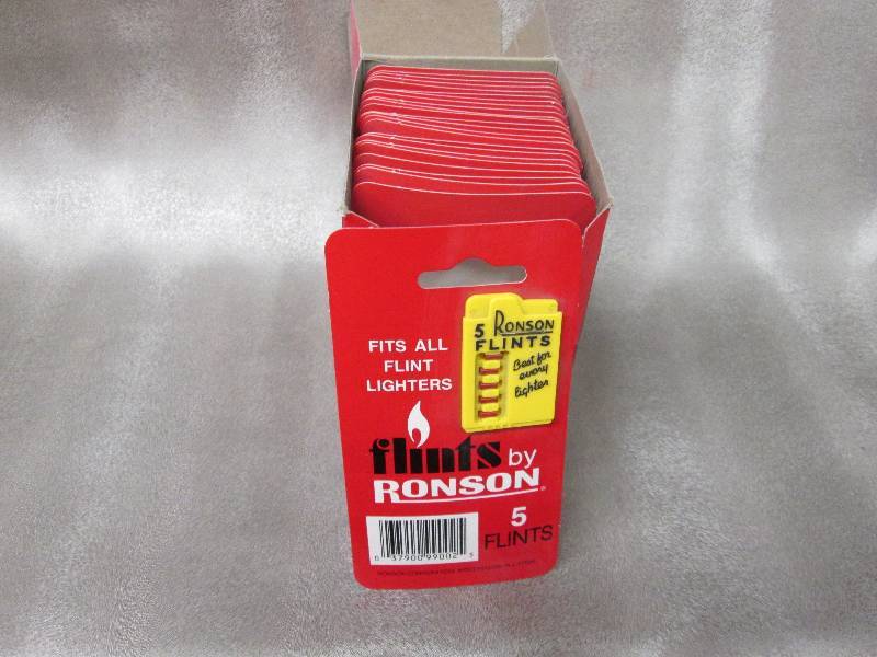 lot 102 image: Box of 24 Ronson 5 Flints per card...