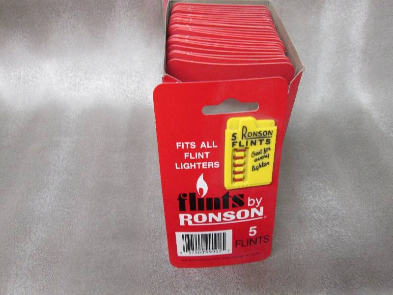 lot 104 image: Box of 24 Ronson 5 Flints per card...