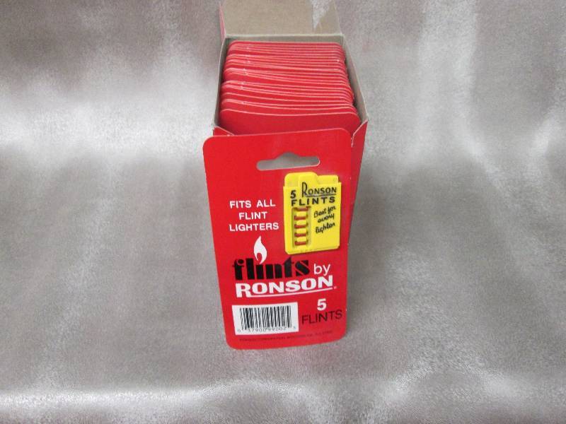 lot 105 image: Box of 24 Ronson 5 Flints per card...