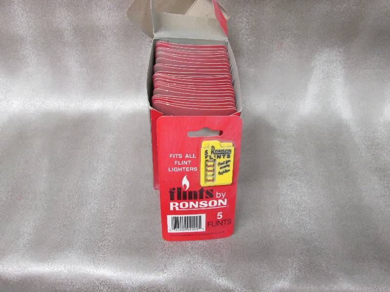 lot 153 image: Box of 24 Ronson 5 Flints per card...