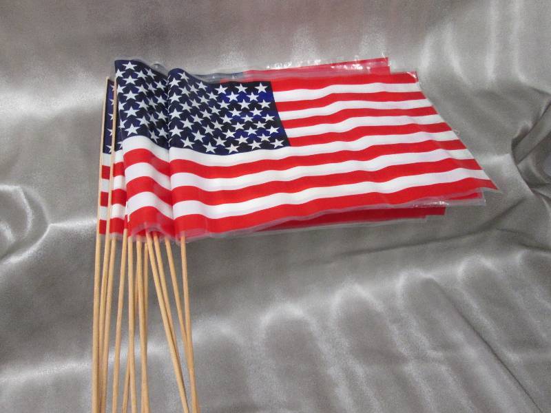 lot 157 image: Lot of 12 plastic American Flags wi...