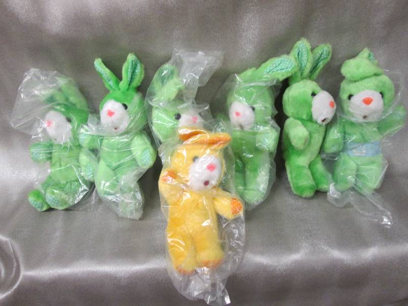 lot 168 image: Lot of 7 plush bunnies 6 green, 1 y...