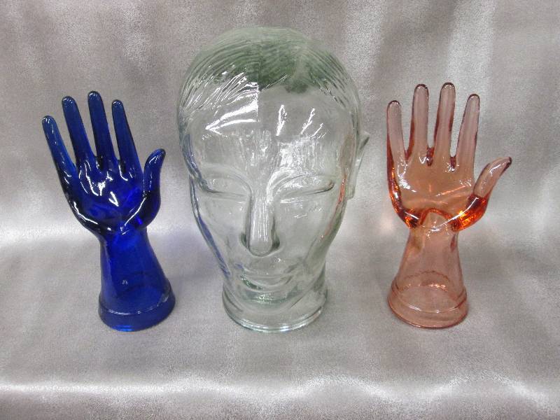 lot 202 image: Glass head figure, 1 blue and 1 ora...