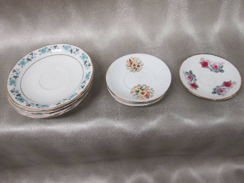 lot 206 image: Assorted patterned china saucers wi...