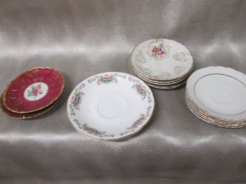 lot 207 image: Assorted patterned china saucers wi...