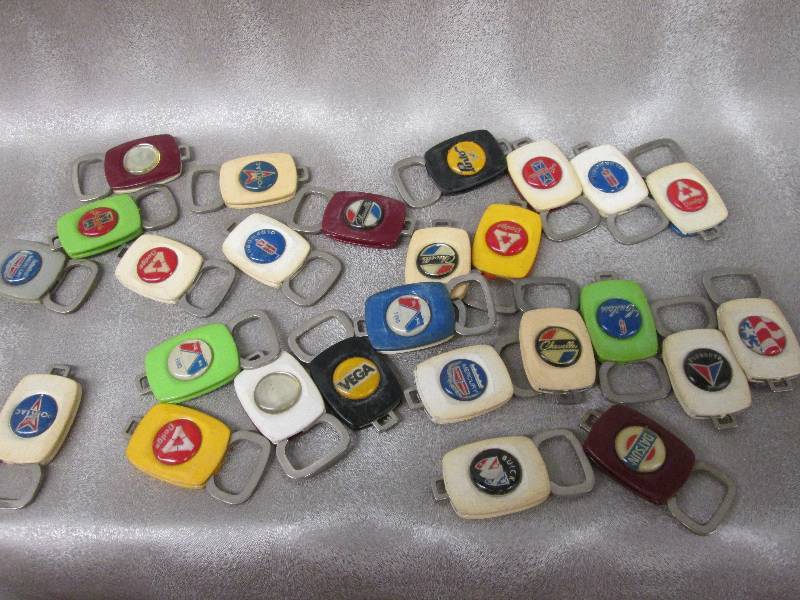 lot 215 image: Lot of car brandmodel key chains...