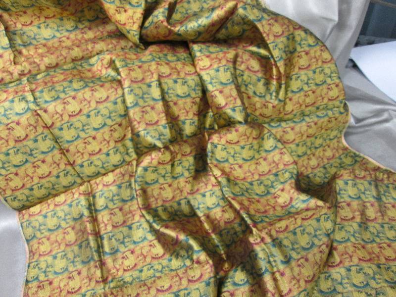 lot 234 image: Rich colored fabric...