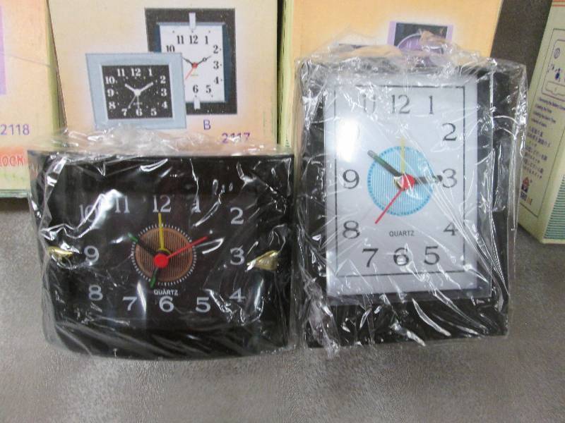 lot 239 image: Lot of 4 quartz alarm clocks...