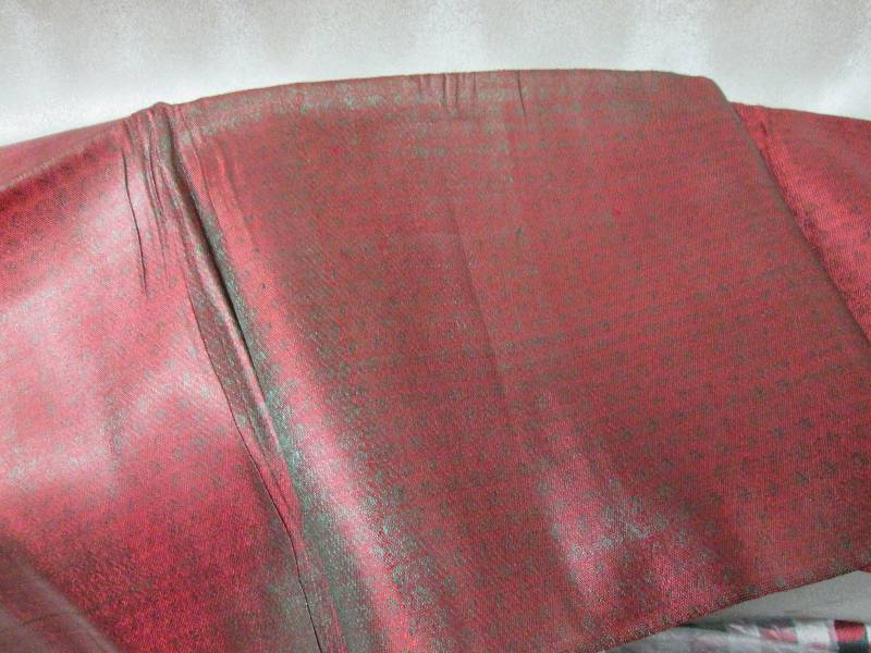 lot 256 image: Heavy red fabric yardage, possible ...