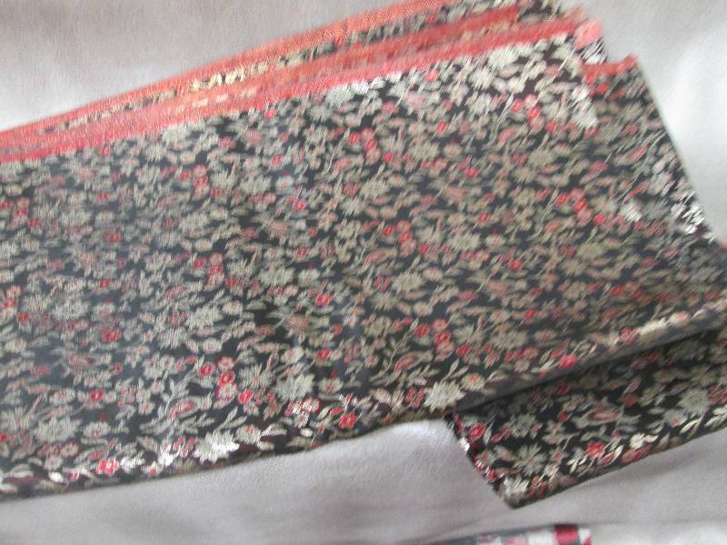 lot 258 image: Heavy blackred patterned fabric ya...