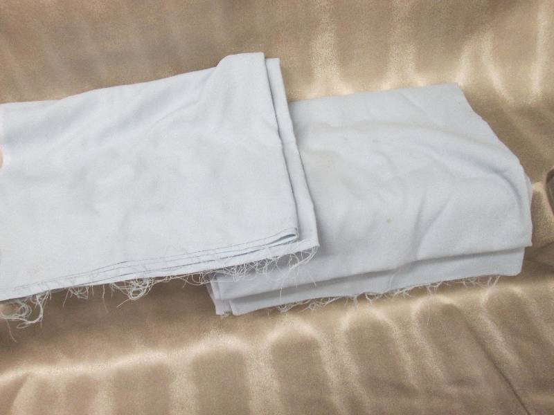 lot 263 image: Light blue fabric yardage...