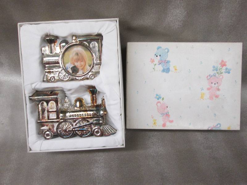 lot 298 image: Baby Gift Train bank and photo fra...