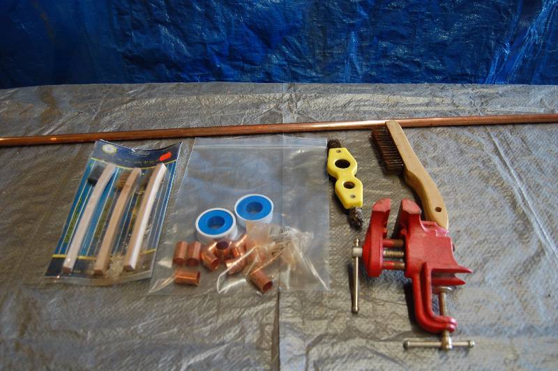 lot 84 image: Misc Plumbing Supplies and Vise