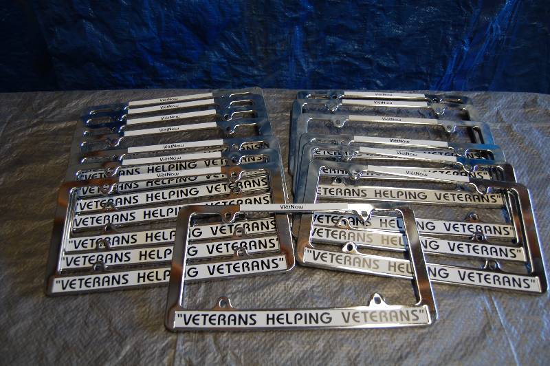 lot 111 image: Metal License Plate Covers