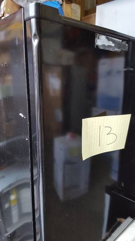 lot 13 image: Haier 2.7 CU FT Refrigerator Freezer model HC27SW20RB small dent on side of door tested works well