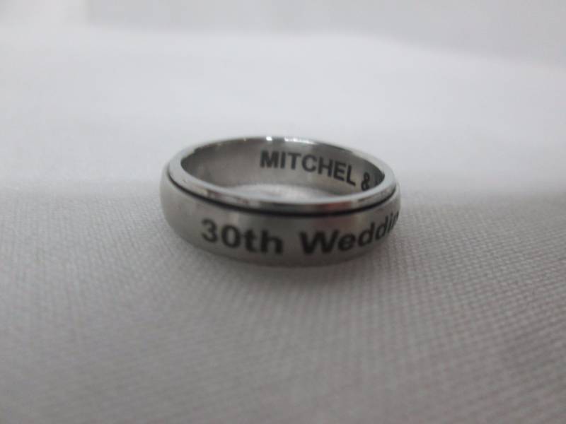 lot 78 image: Stainless Steel Ladies Personalized Spinner Ring