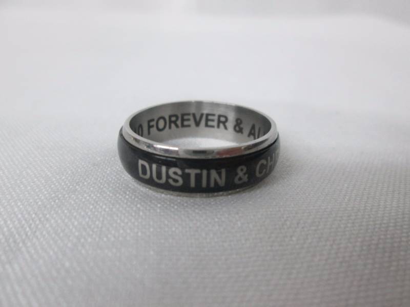 lot 80 image: Stainless Steel Personalized Couples Spinner Ring