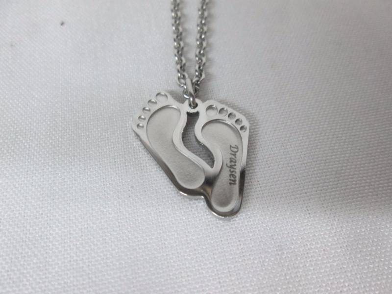 lot 95 image: Silvertone Personalized Babys Footprint Pendant