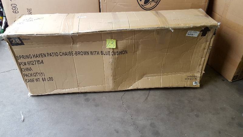 lot 23 image: Spring Haven Brown All-Weather Wicker Patio Chaise Lounge with Sky Blue Cushions