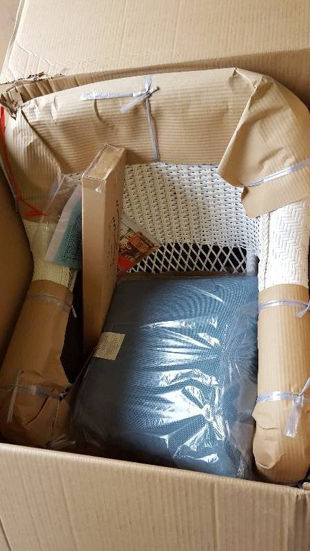 lot 15 image: Martha Stewart Charlottetown White All-Weather Wicker Patio Rocking Chair with Washed Blue Cushion New