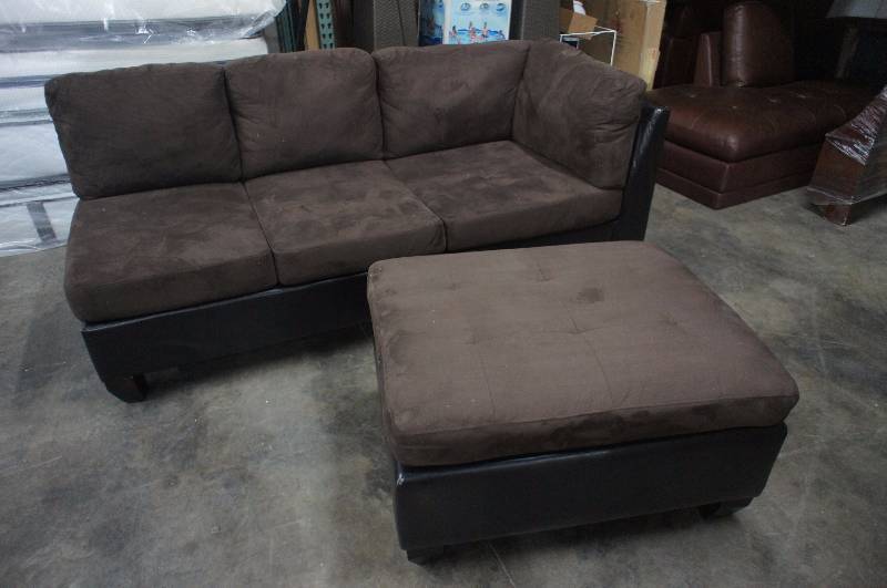 lot 18 image: 82 High End FabricLeather Sofa with Ottoman. Dimensions 82W X 35D X 31T, Ottoman 37 X 29 X 21