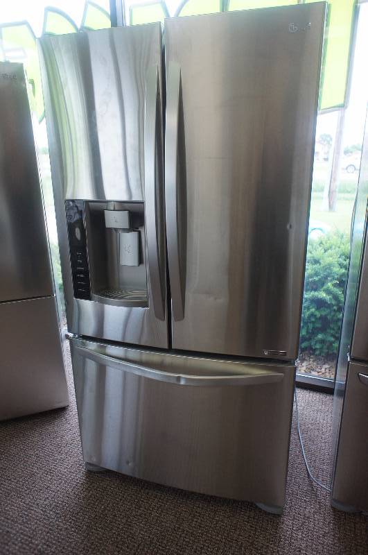 lot 1 image: LG Refrigerator- Model # (LFX25974ST)