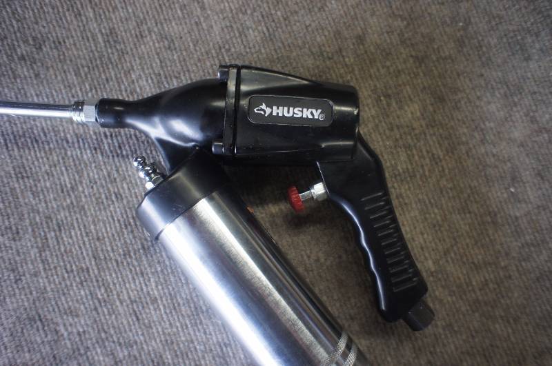 lot 89 image: Husky Grease Gun