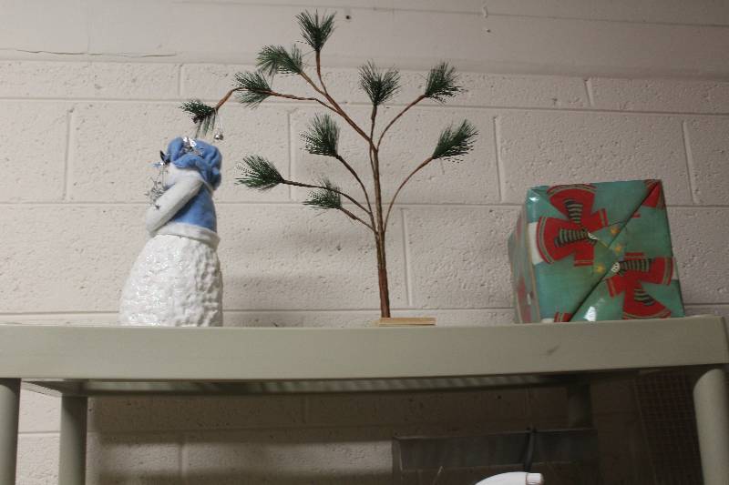 lot 269 image: Contents of (2) 5-Shelf Racks Including Decorations, Cleaning Supplies, Towel Dispenser, Hose, Hanging Track Pendent Lights, Water Cooler